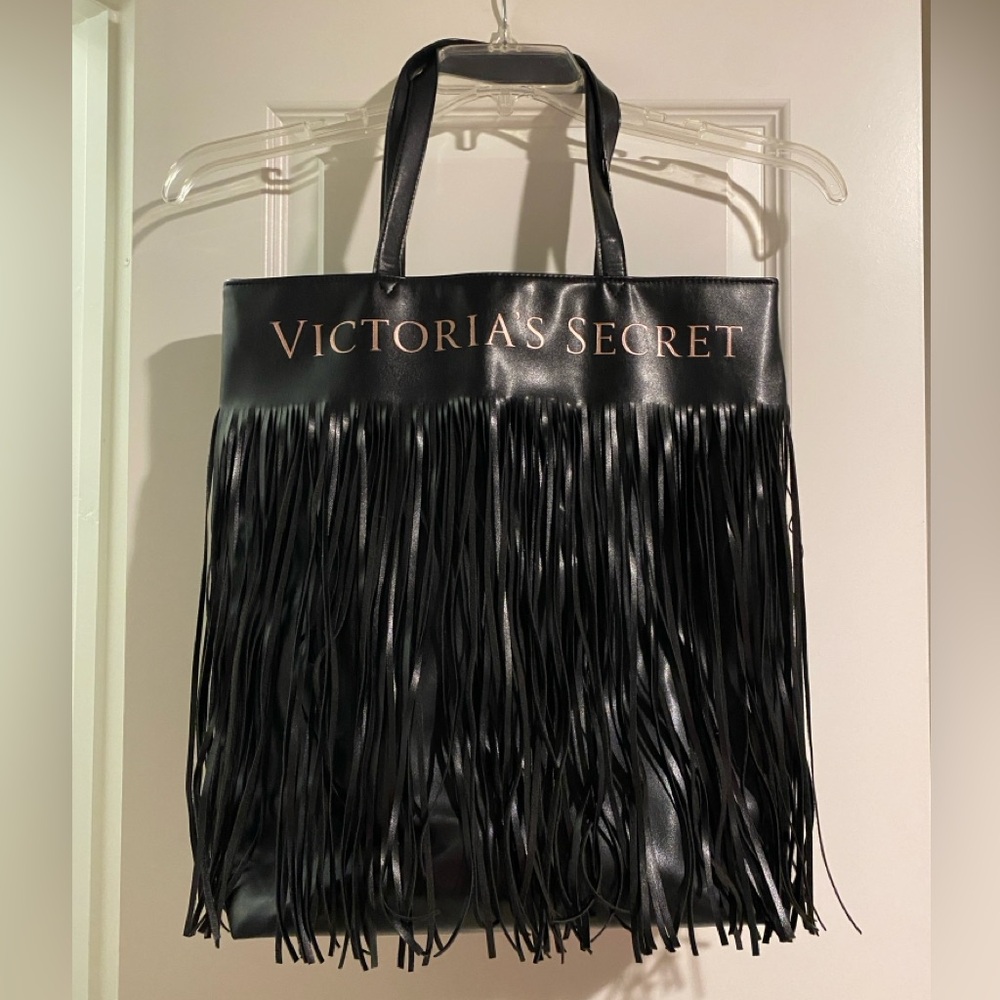 Victoria’s secret black fringe tote bag with one interior pocket EUC